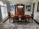 Traditional dining room featuring a large wood table and hutch at 365 Autumn Breeze Dr, Roswell, GA 30075