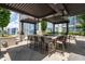 Outdoor kitchen area features a long bar with seating at 855 Peachtree Ne St # 2713, Atlanta, GA 30308