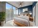Bedroom with floor-to-ceiling windows offering lots of natural light and great city views at 855 Peachtree Ne St # 2713, Atlanta, GA 30308