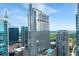 Exterior of modern glass high-rise building with rooftop pool at 855 Peachtree Ne St # 2713, Atlanta, GA 30308