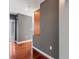Hallway with hardwood floors, neutral paint, and base trim at 855 Peachtree Ne St # 2713, Atlanta, GA 30308