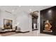 Elegant lobby featuring modern artwork, comfortable seating, and sophisticated wood paneling at 855 Peachtree Ne St # 2713, Atlanta, GA 30308