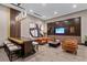 Modern lounge with comfortable seating, large wall-mounted TV, contemporary art, and bar height table at 855 Peachtree Ne St # 2713, Atlanta, GA 30308