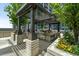 Outdoor kitchen and dining area with modern appliances at 855 Peachtree Ne St # 2713, Atlanta, GA 30308