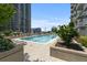 Rooftop pool offers a relaxing retreat with lounge chairs and city views at 855 Peachtree Ne St # 2713, Atlanta, GA 30308