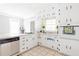 Bright kitchen with white cabinets and modern appliances, providing a clean and efficient cooking space at 1624 Beecher Sw St, Atlanta, GA 30310