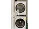 This laundry room has a stacked white washer and dryer unit at 1624 Beecher Sw St, Atlanta, GA 30310