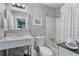 Cozy bathroom with shower-tub combo, marble vanity, and neutral gray walls at 5 Newport Nw Pl, Atlanta, GA 30318