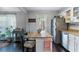 Eat-in kitchen featuring stainless steel appliances, hardwood floors, and a butcher block kitchen island at 5 Newport Nw Pl, Atlanta, GA 30318