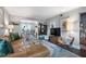 Comfortable living room featuring a stylish leather sofa, plush chair, and elegant decor at 5 Newport Nw Pl, Atlanta, GA 30318