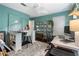 Bright home office with ample desk space, storage shelves, and natural light at 5 Newport Nw Pl, Atlanta, GA 30318