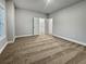 Neutral bedroom features a large closet, plush carpet, and natural light at 5291 Tuscany Dr, Douglasville, GA 30135