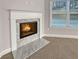 Elegant fireplace featuring a marble hearth and trim, adding warmth and style at 5291 Tuscany Dr, Douglasville, GA 30135