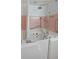 Accessible bathroom with accessible walk-in tub and shower with safety bars at 6835 Castleton Dr, Sandy Springs, GA 30328