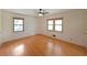 Bedroom featuring hardwood floors and natural light coming through windows at 6835 Castleton Dr, Sandy Springs, GA 30328