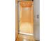 Residential elevator with wood paneled walls and flooring at 6835 Castleton Dr, Sandy Springs, GA 30328