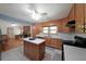Open kitchen design with stainless steel appliances and lots of storage; adjacent to the living area at 6835 Castleton Dr, Sandy Springs, GA 30328