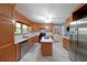 Well-appointed kitchen with a center island, stainless steel appliances, and ample cabinet space at 6835 Castleton Dr, Sandy Springs, GA 30328