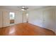 Main bedroom featuring hardwood floors with an ensuite bath and closets at 6835 Castleton Dr, Sandy Springs, GA 30328