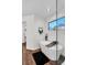 Luxurious bathroom with freestanding tub, modern fixtures, and large window for natural light at 1172 Rockmart Nw Cir, Kennesaw, GA 30144