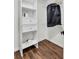 Organized walk-in closet with built-in shelving and drawers, providing ample storage solutions at 1172 Rockmart Nw Cir, Kennesaw, GA 30144