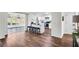 Modern kitchen featuring white cabinets, stainless steel appliances, and a breakfast bar at 1172 Rockmart Nw Cir, Kennesaw, GA 30144
