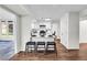Open-concept kitchen with stylish bar seating and modern appliances, perfect for entertaining and everyday living at 1172 Rockmart Nw Cir, Kennesaw, GA 30144