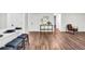 Open-concept living space with hardwood floors, stylish decor, and an inviting atmosphere at 1172 Rockmart Nw Cir, Kennesaw, GA 30144