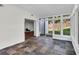 Bright sunroom with large windows, colorful tiled flooring, and a view of the backyard at 1172 Rockmart Nw Cir, Kennesaw, GA 30144