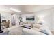 Finished basement with cozy seating, desk space, and a stylish rug at 2151 Desmond Dr, Decatur, GA 30033