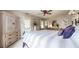 Well-lit bedroom featuring ceiling fan, neutral color palette, decorative art, and natural light at 2151 Desmond Dr, Decatur, GA 30033
