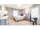 Bright bedroom with neutral colors, carpet flooring, and modern decor at 2151 Desmond Dr, Decatur, GA 30033