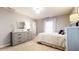 Cozy bedroom featuring neutral colors, plush carpeting, and ample natural light at 2151 Desmond Dr, Decatur, GA 30033