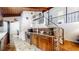 Charming kitchen featuring granite countertops, wooden cabinets, and brick accents at 2151 Desmond Dr, Decatur, GA 30033