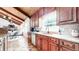 Modern kitchen with stainless steel appliances, granite countertops, and wooden cabinets at 2151 Desmond Dr, Decatur, GA 30033