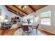 Bright living room features hardwood floors, a fireplace, and large windows at 2151 Desmond Dr, Decatur, GA 30033