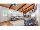 Open-concept living room features vaulted wood ceiling, stylish furniture, and hardwood floors at 2151 Desmond Dr, Decatur, GA 30033