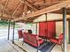 Outdoor space featuring a bar area, seating, and a large red sliding door at 2151 Desmond Dr, Decatur, GA 30033