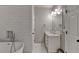 Bathroom featuring a standalone tub, tiled shower, and white vanity at 2895 Cross Creek Dr, Cumming, GA 30040