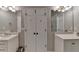 Bathroom features double sinks and a closet for storage at 2895 Cross Creek Dr, Cumming, GA 30040