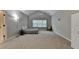 Spacious bedroom has high ceilings, a ceiling fan, and lots of natural light at 2895 Cross Creek Dr, Cumming, GA 30040