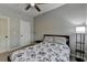 Comfortable bedroom featuring a ceiling fan and natural light at 2895 Cross Creek Dr, Cumming, GA 30040
