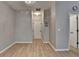 Inviting entryway with hardwood floors, neutral walls, and access to multiple rooms, offering a warm welcome at 2895 Cross Creek Dr, Cumming, GA 30040