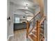 Inviting foyer with hardwood floors, a staircase with iron spindles and a view into the living room at 2895 Cross Creek Dr, Cumming, GA 30040