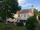 Wide view of backyard with sunroom and patio at 323 Dewpoint Ct # 35, Marietta, GA 30064