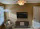 Cozy bedroom featuring neutral walls, a ceiling fan, and a decoratively decorated side wall at 323 Dewpoint Ct # 35, Marietta, GA 30064