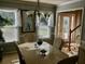 Cozy dining room featuring a chandelier and bright windows at 323 Dewpoint Ct # 35, Marietta, GA 30064
