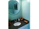 Updated powder room with granite countertop and round mirror at 323 Dewpoint Ct # 35, Marietta, GA 30064
