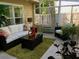 Cozy sunroom with lots of natural light and comfortable furniture at 323 Dewpoint Ct # 35, Marietta, GA 30064