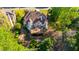 Aerial view of home with a deck at 5685 Commons Ln, Alpharetta, GA 30005